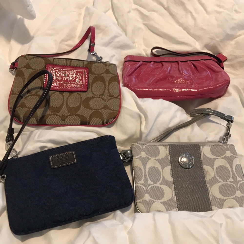 Set of four coach wristlets